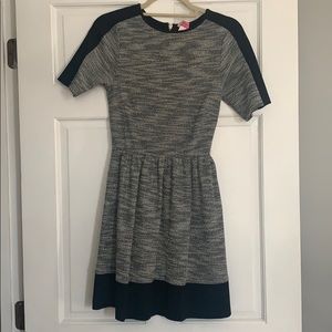 Black, white, and gray dressed